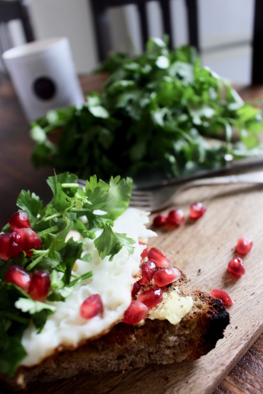 healthy avocado bread with egg pomegranate breakfast toast