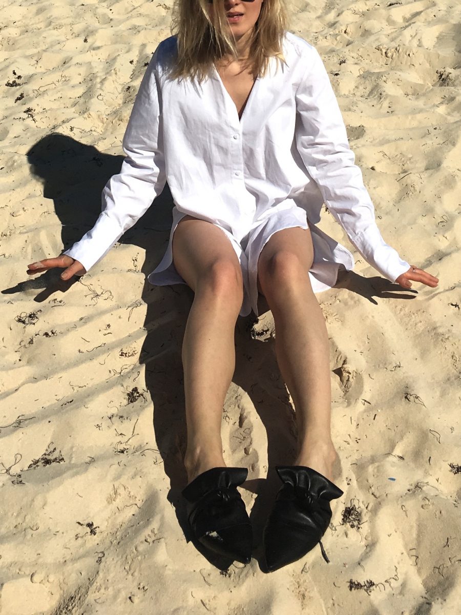 white shirt on the beach