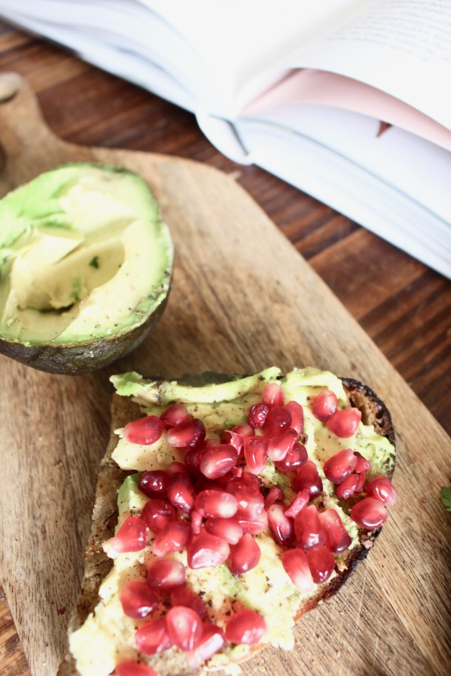healthy avocado bread with egg pomegranate breakfast toast